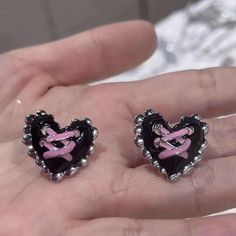 Elevate your style with our Pastel Goth Corset Heart Earrings. These metal earrings feature a heart-shaped design with corset ribbon details, perfect for a cute, cool, and unique aesthetic. Pastel goth aesthetic Heart shaped design Corset ribbon details on heart Metal Package: 1 pair of earrings Corset Ribbon, Girly Goth, Pastel Goth Aesthetic, Green Contacts Lenses, Purple Contacts, Aesthetic Heart, Fall Sweaters For Women, Goth Accessories, Goth Corset