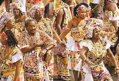 a group of people dressed in colorful costumes