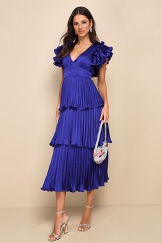 You'll radiate with effortless lavishness all day long with a look like the Lulus Stunning Desire Cobalt Blue Satin Pleated Tiered Midi Dress! Sleek pleated woven satin lends luxe dimension to this fabulous dress that features flouncy, ruffled short sleeves, that frame a lightly gathered bodice and an alluring V-neckline. A flattering set-in waist tops a figure-skimming, A-line skirt that boasts tiered layers as it cascades down to an elegant midi hem. Hidden back zipper/clasp. Fit: This garment fits true to size. Length: Ankle length. Size medium measures 51" from shoulder to hem. Bust: Great for any cup size. Waist: Fitted - very fitted at natural waist. Hip: Not Fitted - fuller skirt allows room for hips. Undergarments: May be worn with any standard bra. Fabric: Fabric has no stretch. L Cute Blue Dresses, Lulu Fashion, Aesthetic Outfit Ideas, Tiered Midi Dress, Summer Dress Outfits, Fabulous Dresses, Pleated Midi Dress, Lulu Dresses, Blue Midi Dress