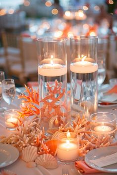 Transform your beach wedding reception with simple, rustic, and elegant decor ideas. Incorporate boho and Indian themes, with seashells and surf elements in the table decorations to create a stunning and unique celebration.Clear chat Round Table Beach Centerpieces, Beach Style Wedding Decorations, Wedding Beach Theme Decorations, Beach Theme Cocktail Party, Beach Theme Rehearsal Dinner Decorations, Beach Wedding Decorations Reception Table Arrangements, Beach Wedding Table Centerpieces Flowers, Wedding Beach Decorations, Ocean Wedding Decorations