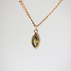 A beautiful Olive Green Sapphire gemstone, which is cut in a marquise shape hanging from a shiny curb chain. A fine piece that you can wear in any occasion. 18k gold plated Stainless steel base Waterproof and tarnish free 16"+2" extender Gemstone measures 9mm*7mm Green Sapphire Necklace, Marquise Necklace, Marquise Sapphire, Personalized Gift Cards, Minimal Chic, Green Sapphire, Sapphire Necklace, Sapphire Gemstone, Curb Chain