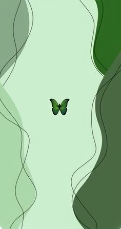 a green butterfly is flying through the air