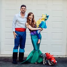 a man and woman dressed up as little mermaids