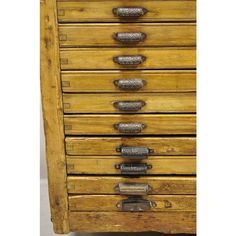 an old wooden dresser with many drawers