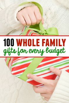 a woman holding a wrapped present with the words, 100 whole family gifts for every budget