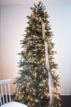 a decorated christmas tree with white lights