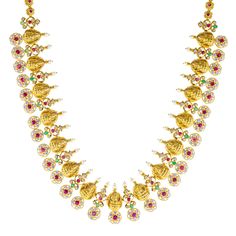 Virani Jewelers offers an exquisite 22k antique gold necklace, adorned with rubies, emeralds, and cubic zirconia. Inspired by traditional Indian jewelry design, this 22k gold and gemstone temple necklace embodies a rich cultural heritage while exuding modern elegance. The antique finish lends an old-world charm to the necklace, making it a standout accessory for special occasions. With its blend of intricate goldwork and vibrant gemstones, this beautiful gold temple necklace is a statement of refined taste and timeless beauty.Features• 22k yellow gold• Antique finish• Engraved details• Emerald• Ruby • Pearl• Cubic zirconiaSpecifications:• Minimum Width - 2.5 millimeters• Maximum Width - 32.6 millimeters• Length - 24 inches• Weight - 97.8 grams Pagadam Jewellery Necklace, Luxury Ruby Temple Necklace With 17 Jewels, Luxury Ruby Temple Necklace, Luxury Temple Necklace With Cutdana For Celebration, Luxury Gold Blouse Piece For Puja, Luxury Cutdana Necklace For Puja, Luxury Yellow Gold Ruby Temple Necklace, Festive Round Temple Necklace, Dhasavatharam Gold Necklace