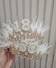 Stunning personalised tiara crown with pearl number detail and rhinestones.  Added extra detailing using marabou feather trim. We can make the crown in silver or gold using any numbers/lettering. Please contact us if you wish to request an option not listed.   The perfect showstopper for a special occasion ♡♡ ☆☆PLEASE READ☆☆ IF YOU LIVE OUTSIDE OF THE UK YOU MUST ADD 2 WEEKS DELIVERY TIME FROM THE DATE OF DISPATCH. Numbers Lettering, Crown Birthday, Birthday Tiara, Tiara Crown, Feather Trim, Birthday Crown, Tiaras And Crowns, 18th Birthday, 40th Birthday