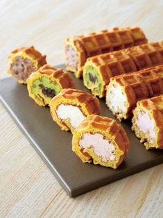 several waffles are arranged on a plate