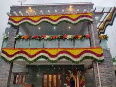 a building decorated with flowers and decorations