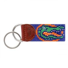 a key chain with an alligator on it