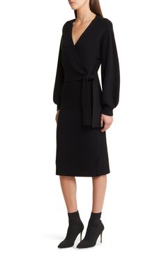 This faux-wrap sweater-dress knit with soft ribbing features a sultry dipped neckline and waist-cinching sash. 40" length (size medium) Surplice V-neck Long sleeves with ribbed cuffs Attached waist tie 50% viscose, 28% polyester, 22% nylon Hand wash, dry flat Imported Black Fitted V-neck Belted Dress, Fall V-neck Midi Dress With Tie Waist, Long Sleeve Belted Dress For Date Night In Fall, Faux Wrap Dress For Evening In Fall, Faux Wrap Dress For Fall Night Out, Faux Wrap Dress For Night Out In Fall, Faux Wrap Evening Dress For Fall, Evening Faux Wrap Dress For Fall, Chic Black Faux Wrap Dress