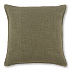 an olive green pillow on a white background