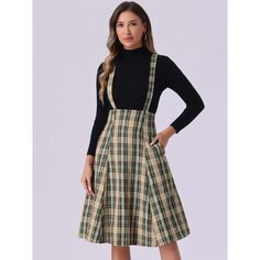 Elevate your wardrobe and showcase your timeless fashion sense with this stunning A-line tweed plaid suspender skirt. This skirt is designed for all body types, featuring adjustable suspenders and contrast plaid decor for a unique and stylish look. Pair it with a stylish ankle boot and a fitted knit or a fancy tie-neck shirt for a touch of glamour. This versatile piece is perfect for any occasion, whether it's a day at the office or a night out with friends. This fashionable and trendy clothes f Fancy Tie, Pinafore Skirt, Tie Neck Shirt, Plaid Decor, Suspender Skirt, Trendy Clothes, Vintage Plaid, Hem Style, Halloween Women