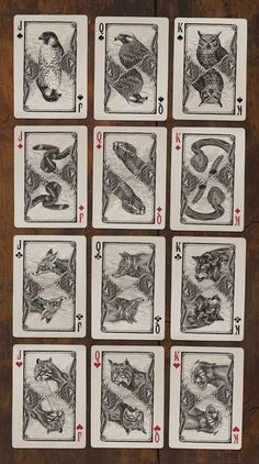 six playing cards with different animals and numbers on them, all in black and white