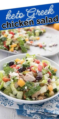 two white plates filled with chicken salad on top of a blue and white table cloth