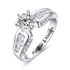 an engagement ring with the words forever and always engraved on it's sidestone