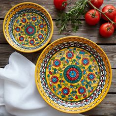 * Round ceramic bowl set. * Set of small and large size serving bowls . * Large - 11" Diameter, 2" height. * Small - 7" Diameter, 2" height. * Yellow, red, green, blue, and white color. * Colorful floral patterns. * Glazed finish. * Handmade pottery. * Hand painted. * Microwave and dishwasher safe. * Made in West Bank, Palestine. --------------------------------- Ceramics hand painted in vibrant floral patterns are a signature craft of palestinian pottery. Palestinian pottery is one of oldest tr Dish Sponge Holder, Ceramic Bowl Set, Wood Salad Bowls, Elephant Ornament, Mirror With Hooks, Bowl Candle, Christmas Figurines, Pottery Making, Dish Sets