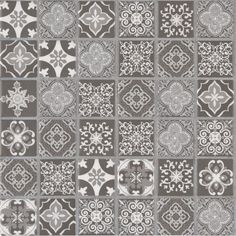 a gray and white tiled wallpaper with different designs on the tiles, including an ornate design