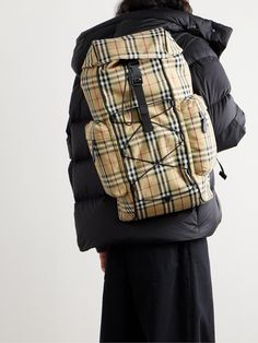 Burberry fans will appreciate the 'Murray' backpack, which is covered in the iconic archival check. Made from lightweight shell, it's trimmed with black leather and has a quilted panel at the back. There are plenty of sections for organising your essentials and a dedicated slip pocket inside for a laptop or tablet. Luxury Backpack With Leather Trim, Luxury Backpack With Leather Patch, Mulberry Cara Backpack, Burberry Backpack, Burberry Horseferry Bag, Black Leather Top, Burberry Accessories, Latest Bags, Black Leather Backpack