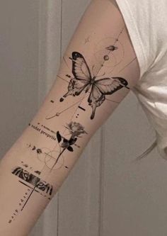 a woman with a butterfly tattoo on her arm