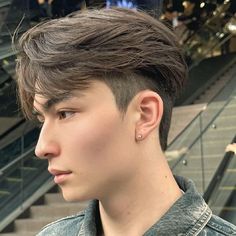 The side part is a timeless and versatile men's hairstyle characterized by a clean parting on one side of the head, with longer hair on top combed over to the opposite side. The sides and back are usually kept shorter, creating a polished and structured look.Longer and combed to one side.Use a comb to create a sharp part and style the top hair smoothly to the side. Sure, here are some hashtags you can use for the side part hairstyle: #SidePart #MensHairstyle #ClassicLook #Grooming #Haircut #MensStyle #BarberLife #HairstyleTrends #GentlemensCut #ModernSidePart #HairFashion #DapperLook #HairInspiration #HairGoals #StyledHair Side Part Hairstyle, Side Part Hairstyles, Men's Hairstyle, Long Hair On Top, Personal Grooming, Longer Hair, Body Reference Poses, Comb Over, Barber Life