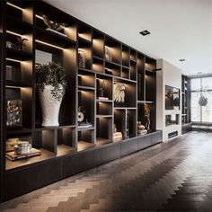 SVAREF High-end interior design inspiration reference image of a custom made dark wooden shelves Modern Bookshelf Design, Luxury Bookcase, Bookcase Design, Shelving Design, Wall Shelves Design, Living Room Design Inspiration, Modern Bookcase, Bookshelf Design