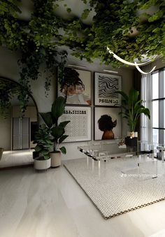 a living room filled with lots of plants and pictures on the wall next to a window