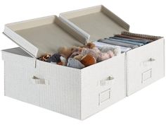 an open storage box filled with stuffed animals