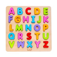 a wooden alphabet puzzle with letters and numbers on it's sides, all in different colors