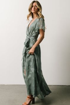 Our new Faye Eucalyptus Maxi Dress is designed to help you look and feel beautiful! It features floral burnout chiffon material and flutter sleeves. Sage Short Sleeve Dresses, Flowy Flutter Sleeve Dress With Tie Waist, Green Chiffon Short Sleeve Dress, Flowy Chiffon Dress With Tie Waist, Green Chiffon Maxi Dress With Short Sleeves, Summer Short Sleeve Sage Dress, Flowy Green Maxi Dress With Tie Waist, Sage Short Sleeve Summer Dress, Short Sleeve Sage Summer Dresses