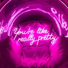 a neon sign that says you're like really pretty