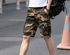 Fit Type: StraightPant Style: RegularStyle: CasualWaist Type: MidMaterial: Cotton, PolyesterLength: Knee LengthClosure Type: DrawstringFabric Type: BroadclothFront Style: Flat ﻿SKU: 581434 Summer Combat Camouflage Bottoms, Summer Outdoor Camouflage Pants, Camouflage Short Pants For Summer, Casual Summer Camouflage Bottoms, Summer Military Camouflage Bottoms, Spring Camouflage Outdoor Bottoms, Camouflage Bottoms For Outdoor Spring Activities, Camouflage Short Pants, Spring Outdoor Camouflage Bottoms