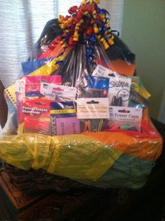 a basket filled with lots of items on top of a table