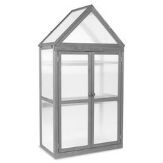 a small gray and white glass greenhouse