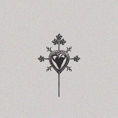 a black and white drawing of a cross with a heart on it's side