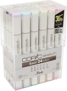 a set of 12 white acrylic markers in a clear box