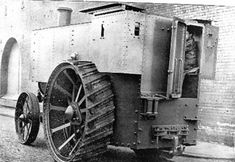 an old black and white photo of a large machine with wheels on it's side