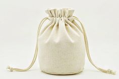 a small white bag sitting on top of a table