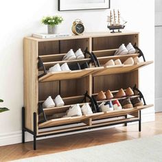 the shoe rack is made out of wood and metal