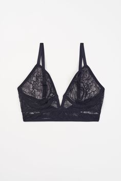 Fresh and romantic, our new Marie collection pivots around its sustainable lace, a feminine floral made from a recycled polyamide and 100% organic cotton blend so soft it almost feels vintage. The Marie Soft Plunge V Wire Bra is the star of the collection, featuring alluring cutouts, a longline silhouette, and a dramatically dipping neckline with built-in wire casing that lifts, separates and supports without an underwire. Wear with the matching Marie Brief or Marie Thong. Available in classic B Wire Bra, Soft Bra, Plunge Bra, Strapless Bra, Plunging Neckline, Long A Line, The Star, Classic Black, Organic Cotton