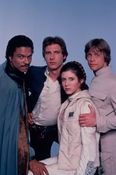 the cast of star wars posing for a photo