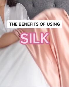 a woman laying in bed with pink sheets on top of her and the text, the benefits of using silk