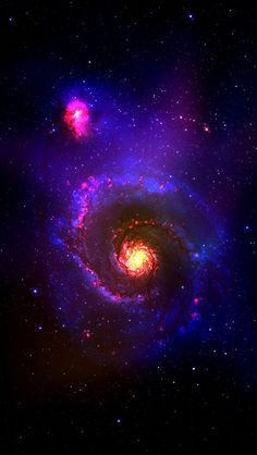 an image of a spiral galaxy in the night sky with stars and bright blue colors