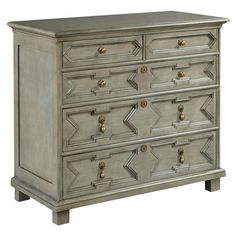 an antique dresser with many drawers and knobs on it's sides, all in grey