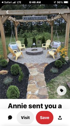 a patio with two chairs and a fire pit