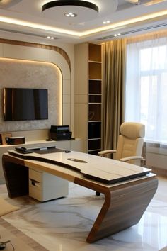 an office with a desk, chair and television