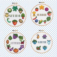 four cross stitch hoops with the words spring, summer and autumn