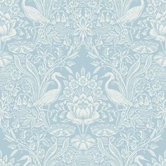 a blue and white wallpaper with birds, flowers and leaves in the middle of it