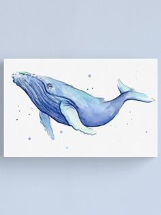 a watercolor painting of a humpback whale on white canvas print wall art